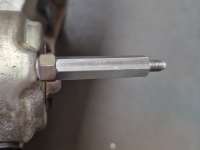 Citroen-2CV - Exhaust manifold heat shield spacer. This spacer is mounted between the starter motor and 